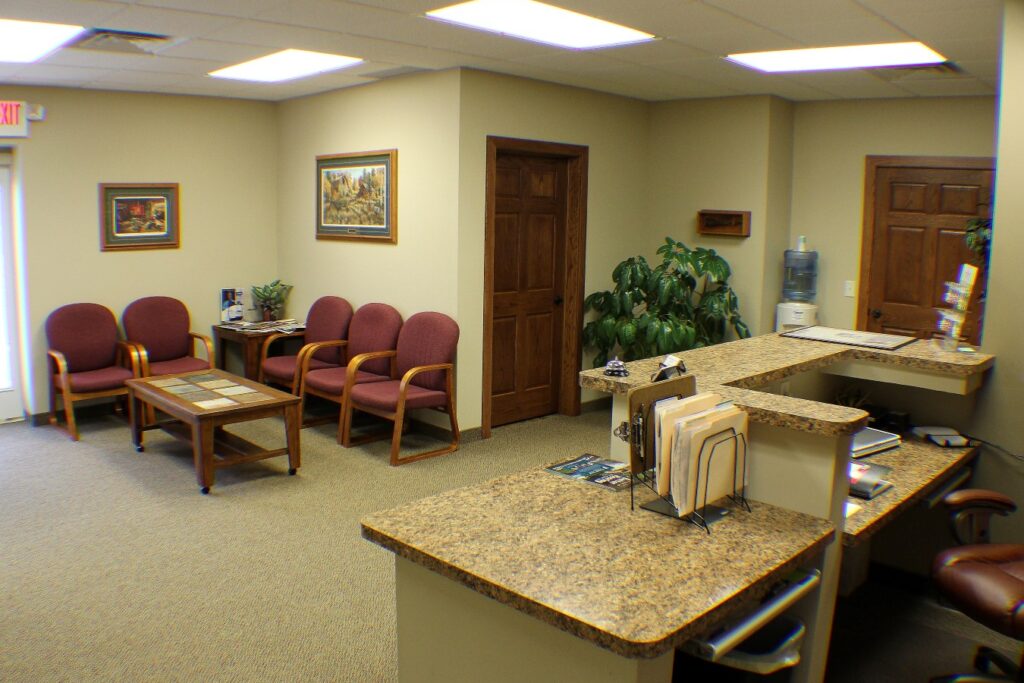 behind front desk and waiting room at Litchfield Hearing Aid Center